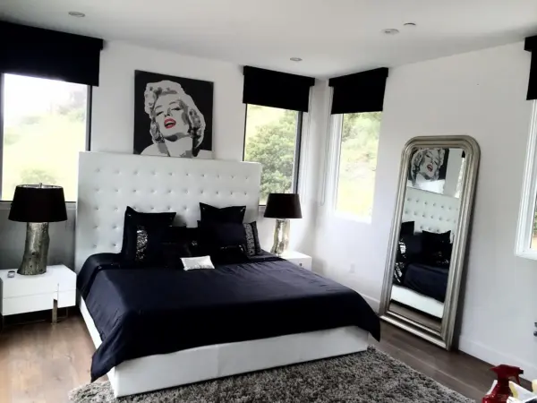 Black-and-white suite with Marilyn Monroe art and panoramic views.