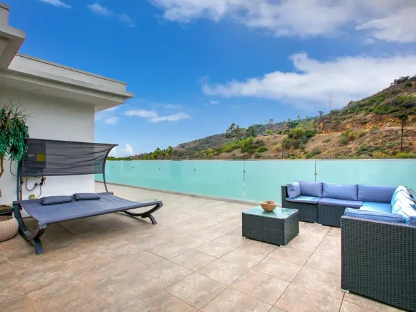 Private rooftop patio for creator reset, open-air shooting, or branded scenes.